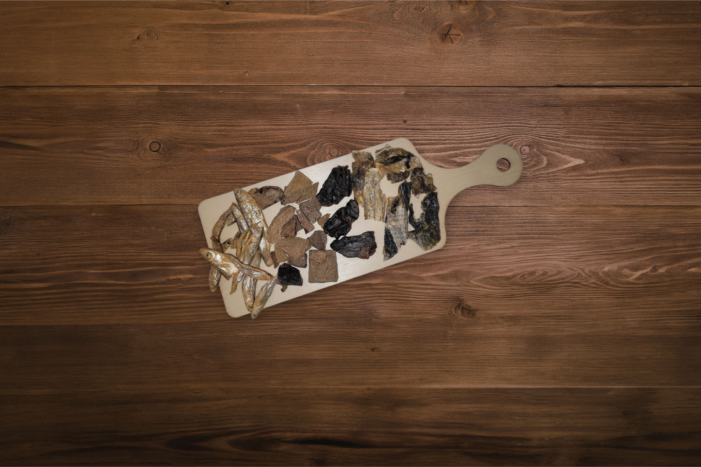 Charcuterie board for cats with freeze-dried treats.