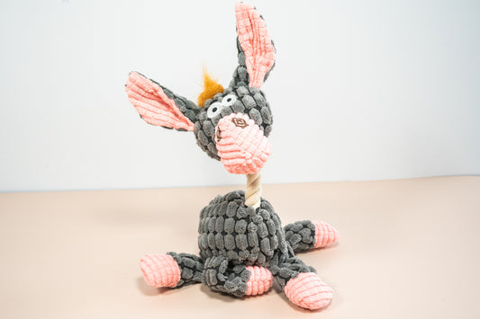 Plush dog toy in donkey shaped with rope neck. | Jouet en peluche pour chien en forme d'âne avec cou en corde.