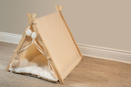 Vue latérale de la tente beige pour animaux.