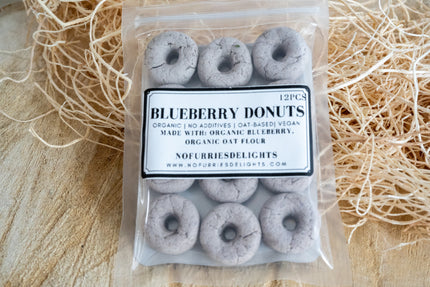 Blueberry donuts for small pets and birds made with blueberry and oat flour.