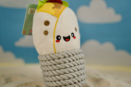 Burrito dog toy, soft and durable, perfect for playing and cuddling on the sand.