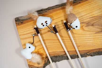 Three cat teaser in natural fiber and with feather.