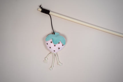 Agace-chat en forme de fraise.