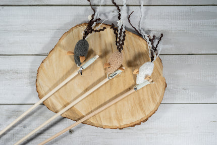 Cat teaser with wand handle made of sturdy wood, and mouse crafted from durable nylon to ensure long-lasting fun.