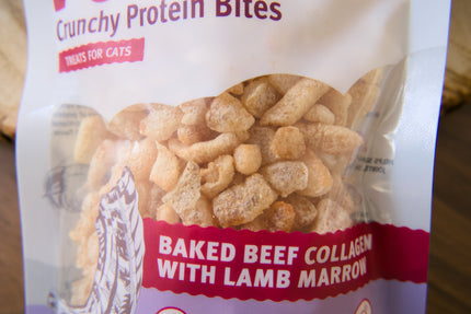 A close-up of a bag of Crunchy Protein Bites cat treats.