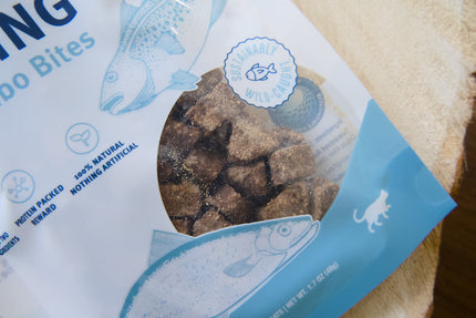 A close-up of a bag of fish-flavored cat treats.
