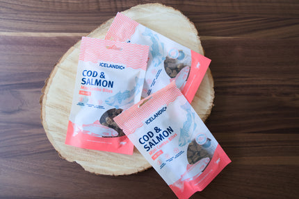 Three packages of Icelandio Cod & Salmon dried fish snacks for cats.