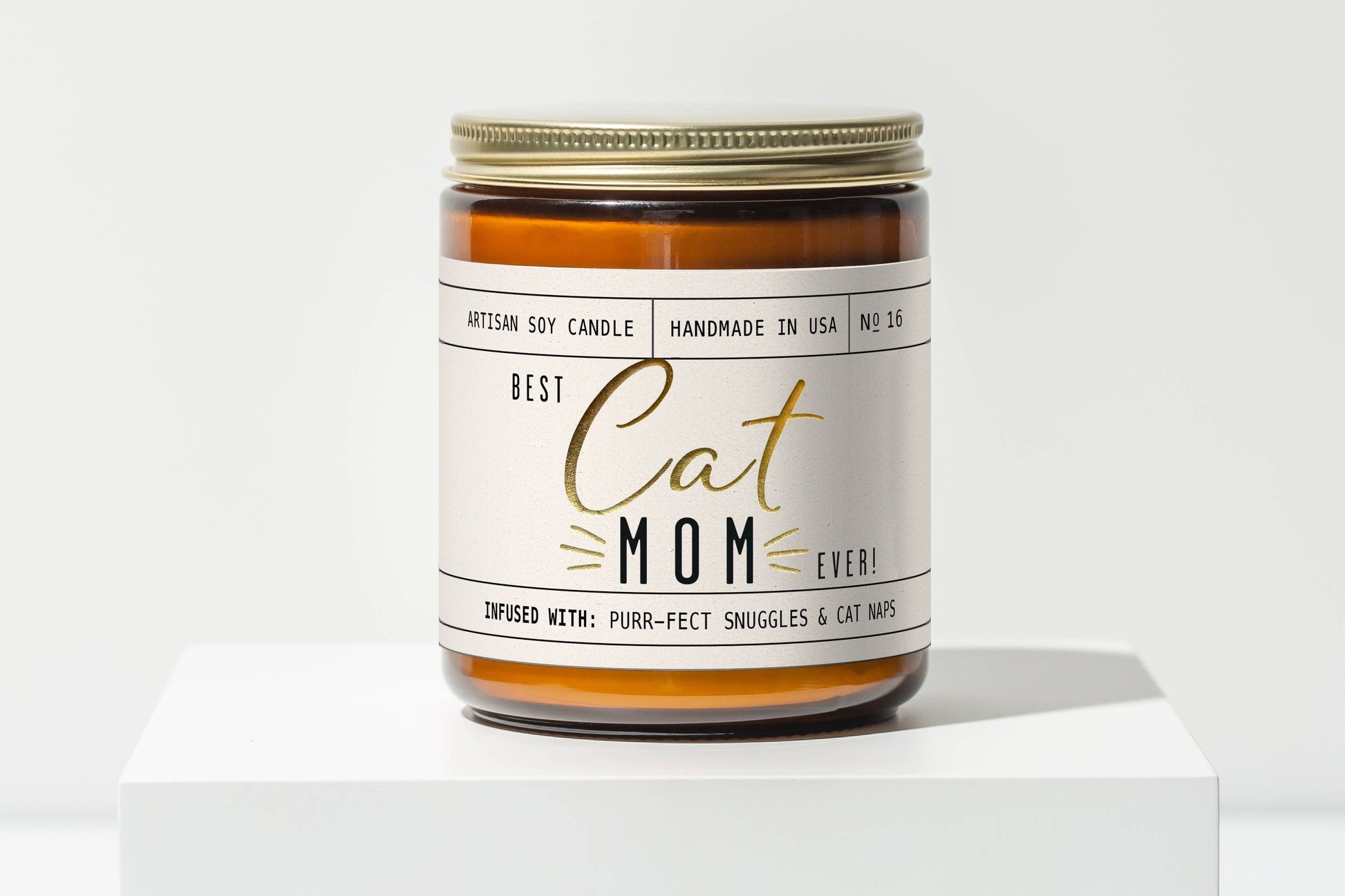 Candle jar labeled 'Best Cat Mom Ever' on a white background.