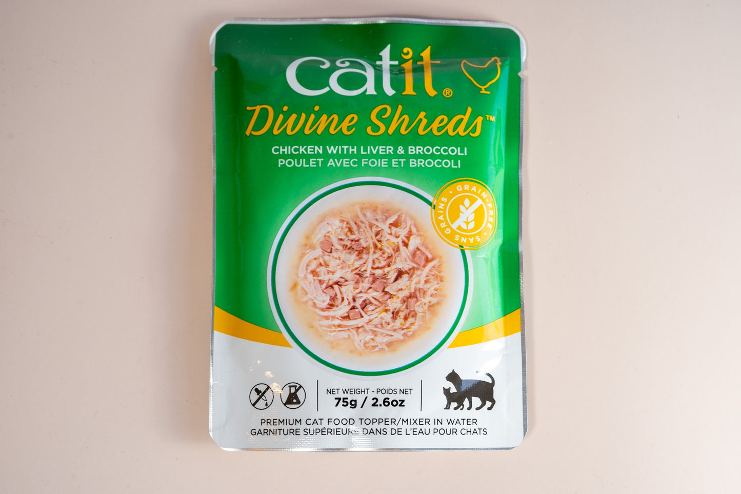 Front view of the Catit Divine Shreds food tooper in water with chicken, liver and broccoli flavor.
