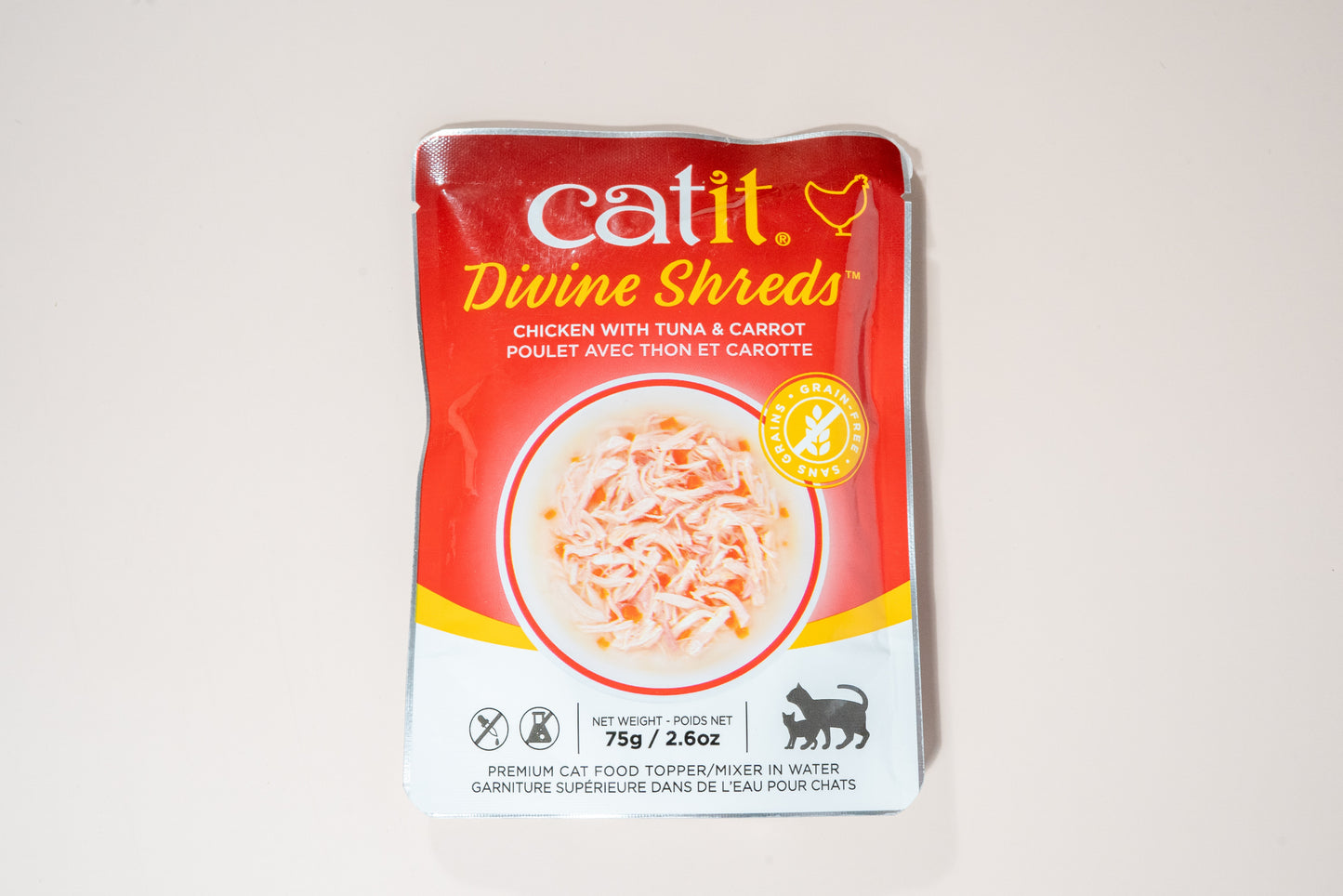 Front view of the Catit Divine Shreds food tooper in water with chicken, tuna and carrot flavor.
