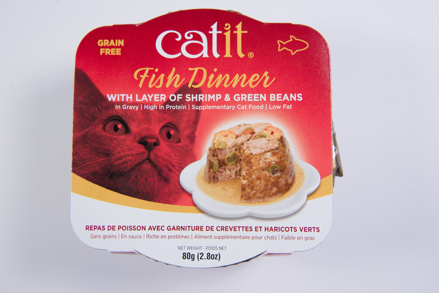 Vue de face de la nourriture humide pour chats Catit Fish Dinner avec une couche de saveur de crevettes et haricots verts.