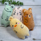 Set of 4 plush catnip toys in pastel colors for cats.