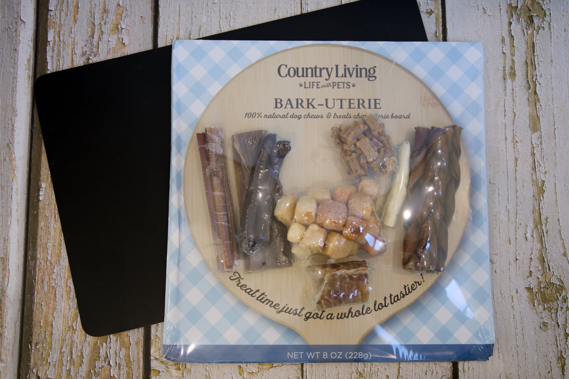Packaged barkuterie dog treat set with 'Country Living Life for Pets' branding on a wooden surface.