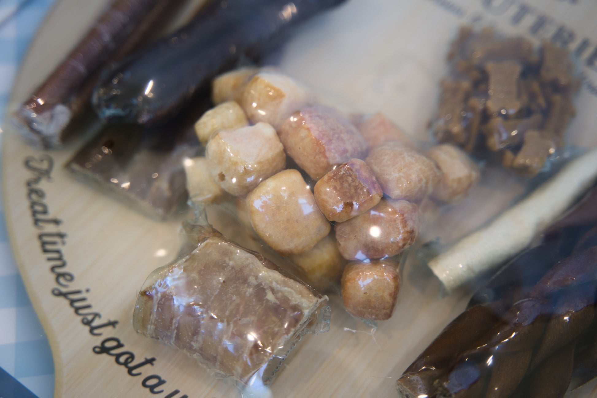 Assorted charcuterie dog treats for items on a plate with text.