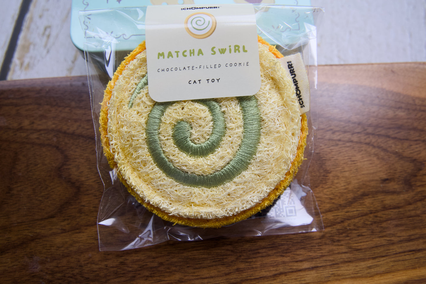 Close-up of the matcha cookie-shaped cat chew toy.