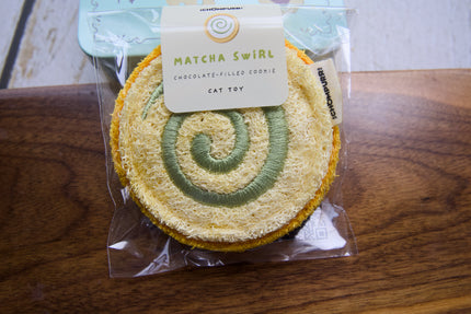 Close-up of the matcha cookie-shaped cat chew toy.