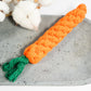Jouet pour chien en forme de carotte tissée en corde de coton résistant et durable.
