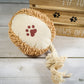 Brown and beige football-shaped soft and rope toy for dogs with 2 different textures.
