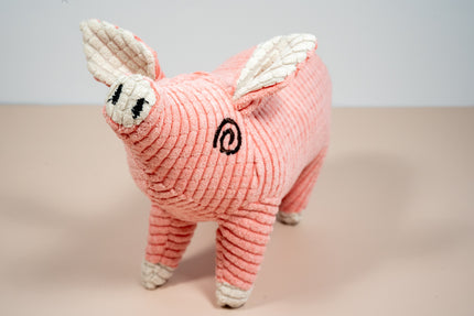 Jouet pour chien en forme de cochon rose.