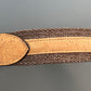 Dog collar with cork strap on a gray background.
