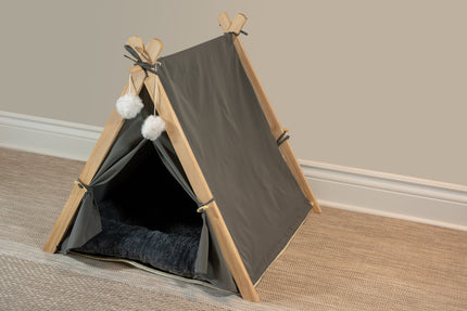 Vue latérale de la tente grise pour animaux.