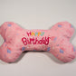 Happy birthday pink plush bone to celebrate your dog's birthday.