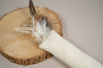 Cat pillow toy made from hemp fabric and filled with natural wool.