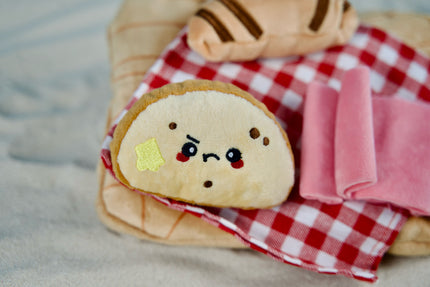 HugSmart charcuterie board puzzle toy with ham straps, hook-and-loop closures and mini snuffle mat