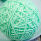 Close-up of the large wool cat ball toy.