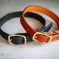 Close up view of the handmade leather 3/4 inch dog collars.