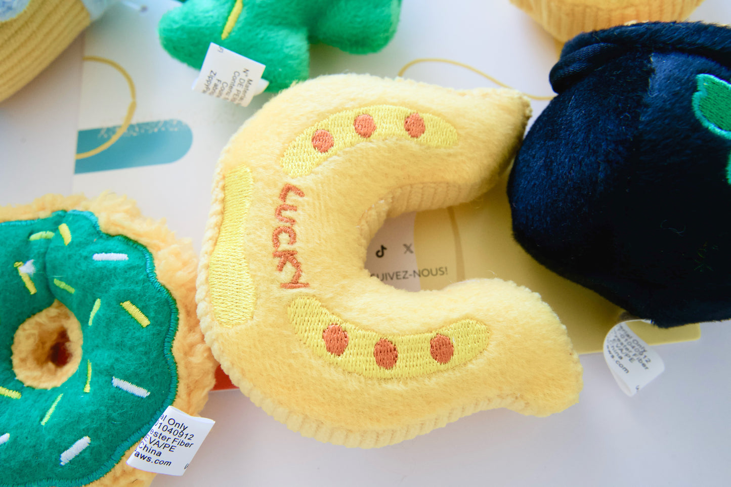 Horseshoe plush dog toy.