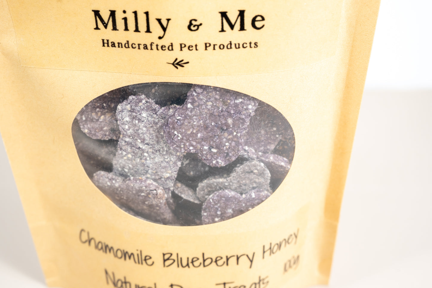Close-up view of the chamomile blueberry honey dog treats.
