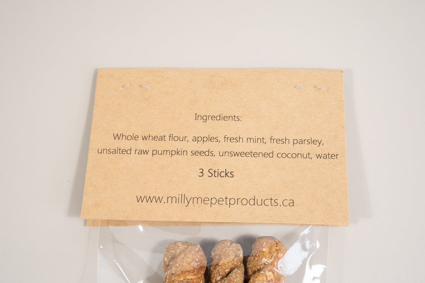 Twisted sticks for dogs are made with whole wheat flour, apples, fresh mint, fresh parsley, unsalted raw pumpkin seeds, unsweetened coconut and water.