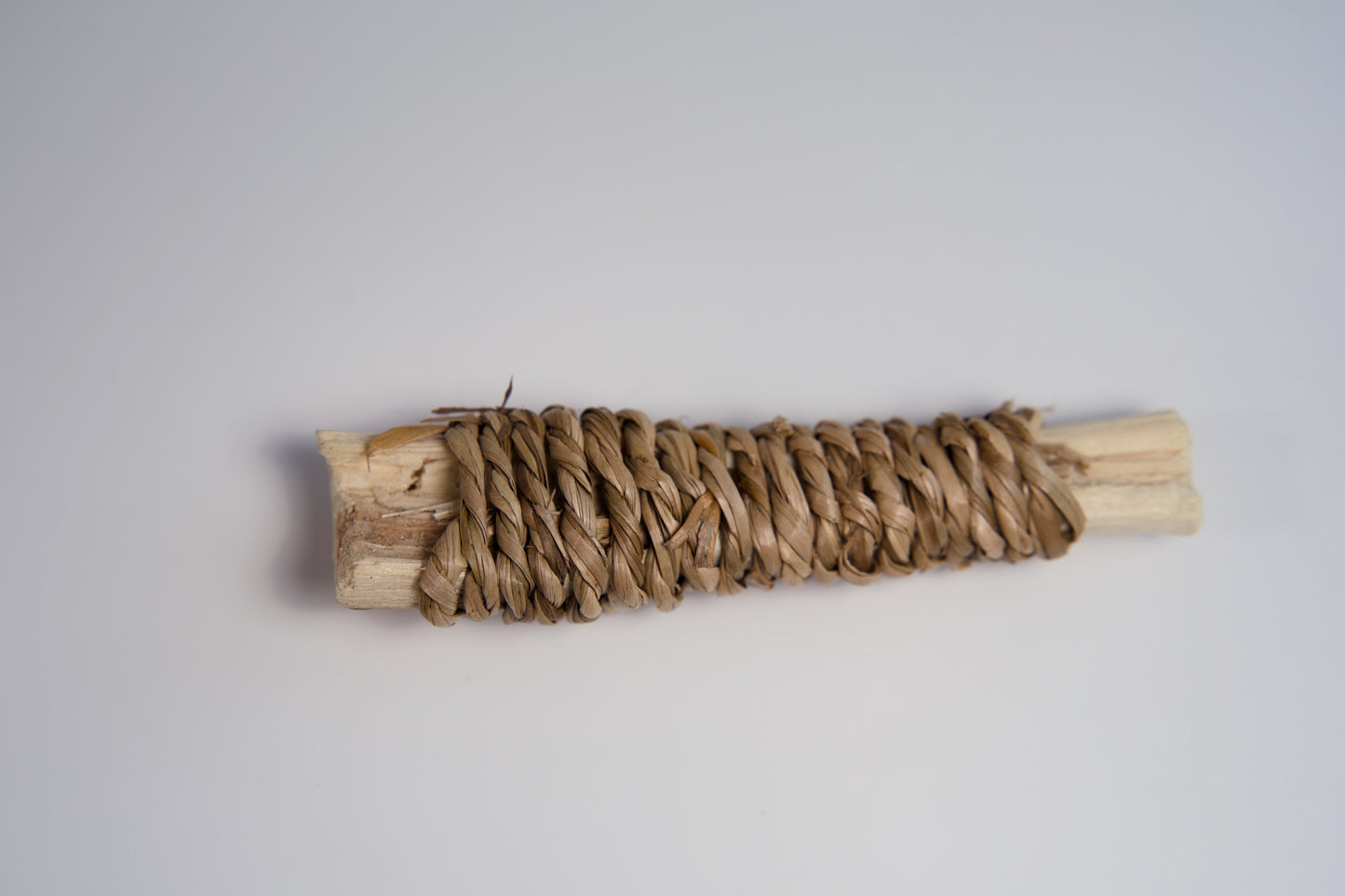 Wooden chew stick for small animals and birds.