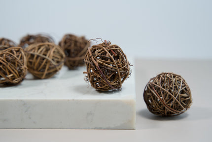 Chewing ball for small rodents made of wooden sticks.
