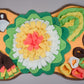 Bone-shaped dog sniffing mat with flowers and a sound effect under the paw design.