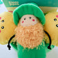 Dog toy figure of a leprechaun with gold coins and a green hat.