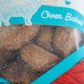 Close-up view of the raw coated dog biscuits.