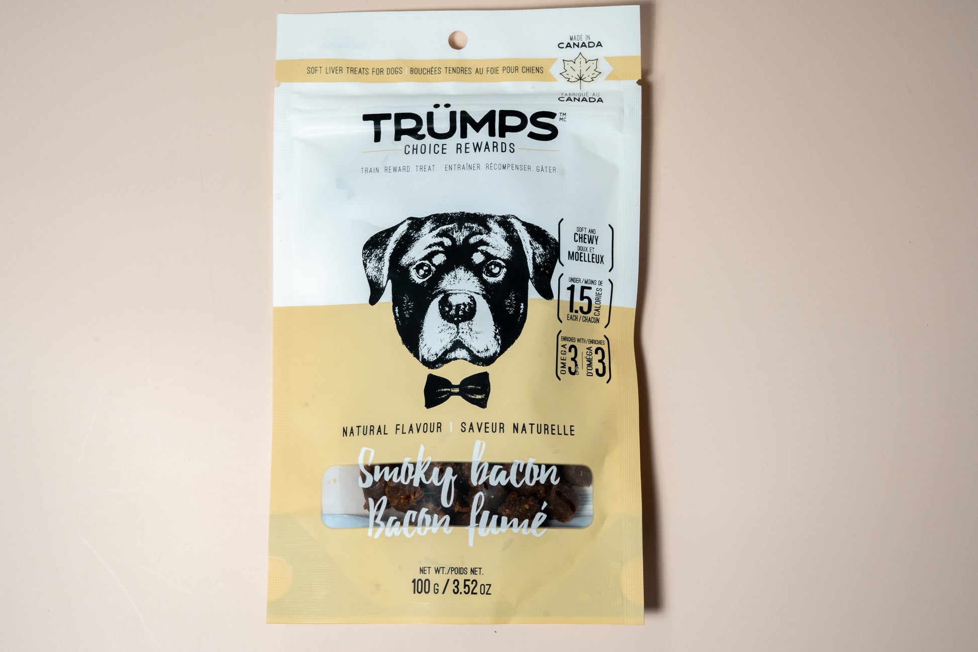 Trumps smoky bacon for dogs is a soft and chewy treat under 1.5 calories each bite and enrobed with omega 3. | Le bacon fumé de Trumps Choice pour chiens est une friandise moelleuse contenant moins de 1,5 calories par bouchée et enrobée d'oméga 3.