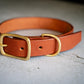 Side view of the tan leather dog collar 1 inch.